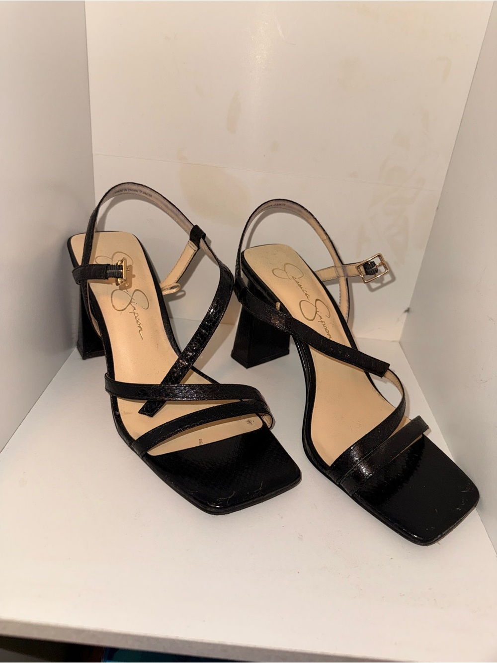 Jessica Simpson Y2K-style black snakeskin block heel sandals
